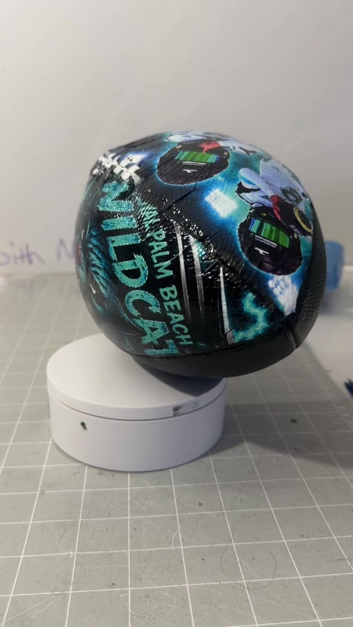 custom footballs wildcats design — actual video still from Party with Franchesca